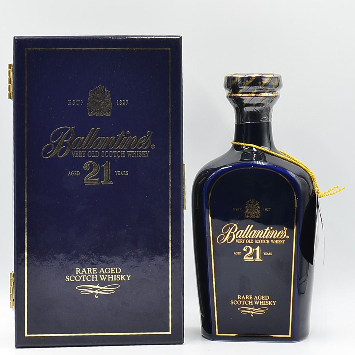 A bottle of Ballantine's 21 Year Old Scotch Blue Wade Decanter